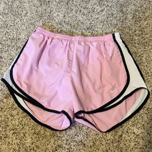worn pink nike shorts